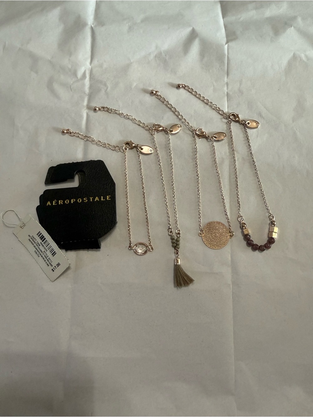 Aeropostale Gold Tone Layered Bracelet Set of 4 Boho Garnet Beads Tassel Charms